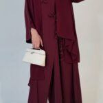 Floral wrap abaya - berry Elegant deep teal abaya featuring delicate 3D floral detailing with pearl-beaded flower centres, inner and outer tie closures Comes with a premium chiffon scarf Fabric - Korean nida Colours - Teal Pardah Uk Abaya