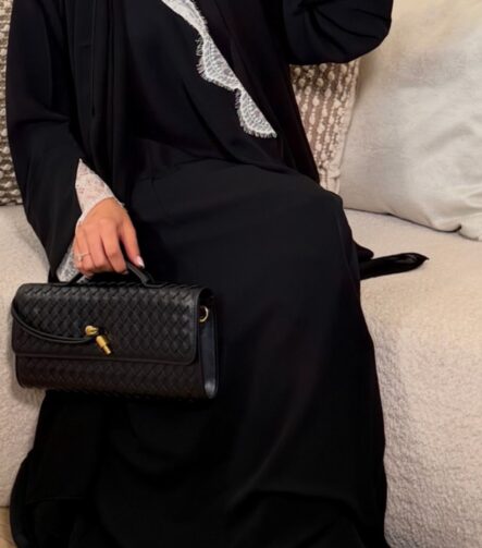 Wrap abaya - Black with white lace Fabric - Korean nida 2 Piece - abaya & scarf Soft, flowing fabric, featuring delicate lace sleeves, an inner tie for a secure fit, and an outer tie for an adjustable, flattering silhouette. Perfect for a timeless and modest look. Pardah UK
