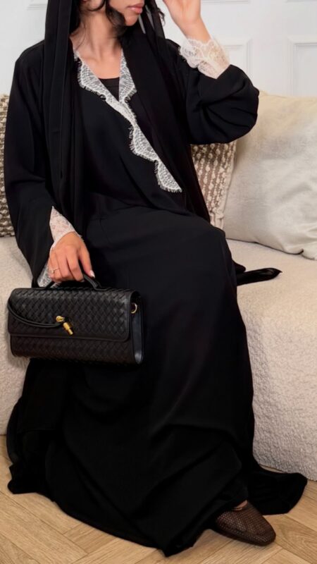 Wrap abaya - Black with white lace Fabric - Korean nida 2 Piece - abaya & scarf Soft, flowing fabric, featuring delicate lace sleeves, an inner tie for a secure fit, and an outer tie for an adjustable, flattering silhouette. Perfect for a timeless and modest look. Pardah UK