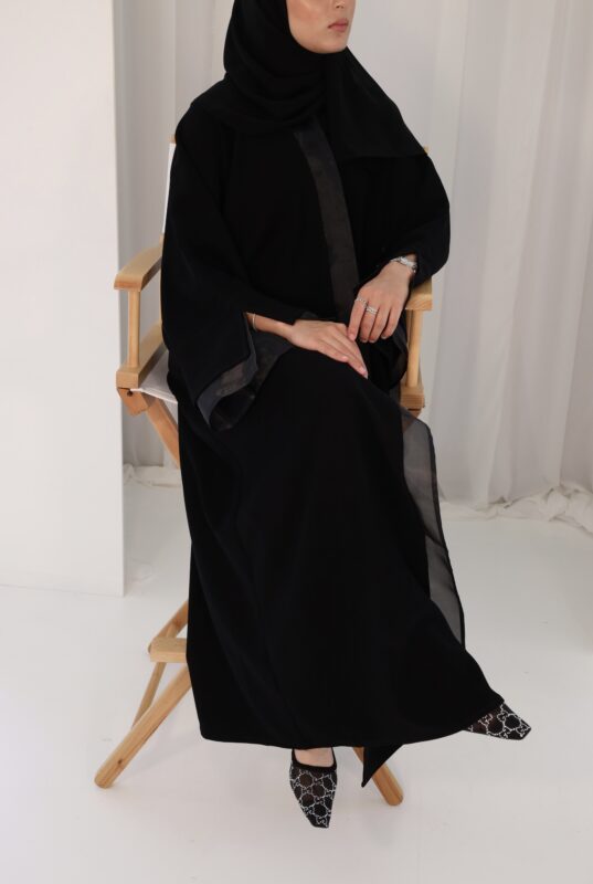 Discover timeless grace with the Layla Abaya. Featuring a sleek, minimalist silhouette and premium lightweight fabric, this modest essential offers refined elegance and all-day comfort for every occasion.
