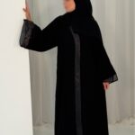 The Layla Abaya redefines modern modesty with its fluid, ankle-grazing silhouette and thoughtful design. The relaxed yet tailored cut offers a flattering drape for all body types, while the breathable, wrinkle-resistant fabric ensures you stay comfortable and polished from morning to night. Perfect for layering or wearing solo, this wardrobe staple brings understated luxury to your everyday edit.