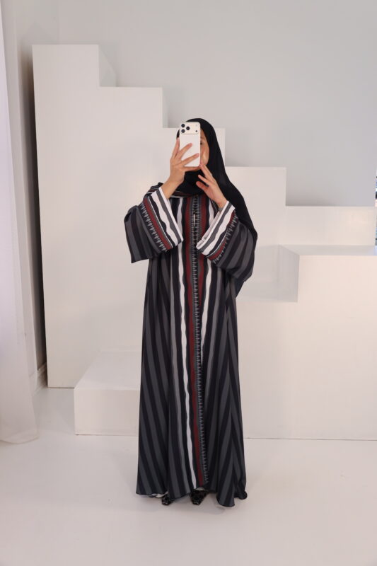 Elevate your wardrobe with the Qamar Abaya. Named for the moon, its ethereal drape and refined finish create a look of understated glamour, designed to move beautifully with you from day to night
