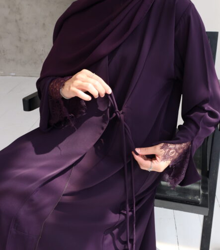 Stunning plum wrap abaya with a graceful draped fit. Crafted from premium, breathable fabric for all-day elegance and effortless style.