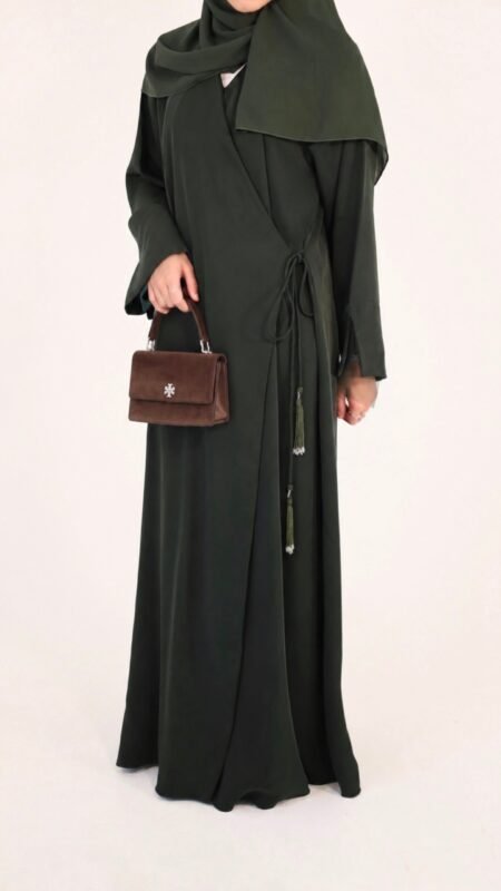 Flowing wrap abaya with delicate net sleeves, secured by hidden snap buttons and finished with an adjustable beaded string wrap